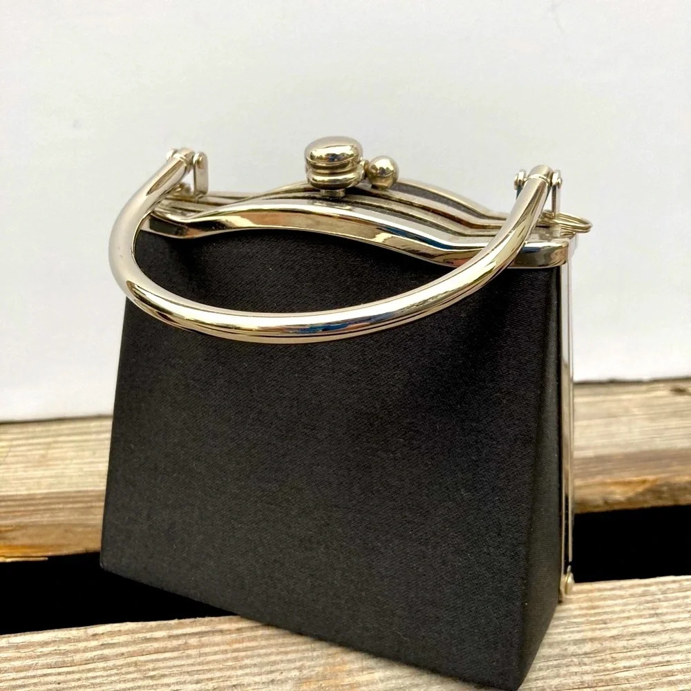 Boxy hinged satin purse